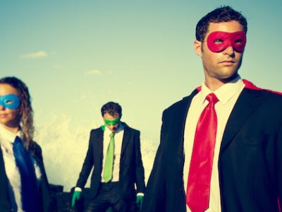 Business superheroes on the beach confident concept